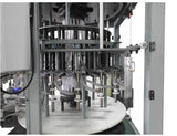 Automatic pressure overflow rotary filler machine, model RF-48-18-BL, by Acasi Machinery Inc., front view