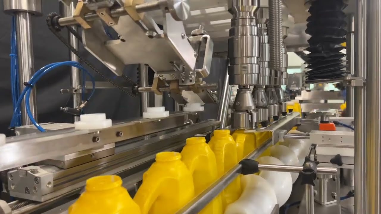 Single head chuck capper machine with vibratory type cap feeder, model ...