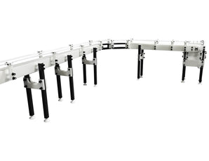 Automatic variable speed power curve and custom chemical resistant conveyor, by Acasi Machinery Inc., left view.