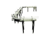 Automatic variable speed power curve and custom chemical resistant conveyor, by Acasi Machinery Inc., left view