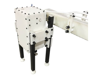 Automatic variable speed power curve and custom chemical resistant conveyor, by Acasi Machinery Inc., right view